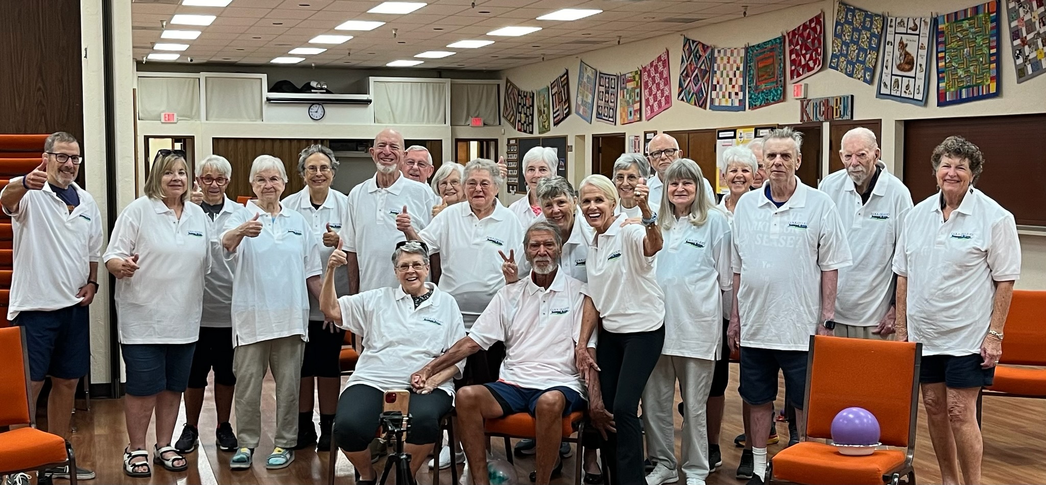 October 2024: Chair Exercise Class wearing new Parkinson's Support Group shirts donated by Ed and Marsha G.